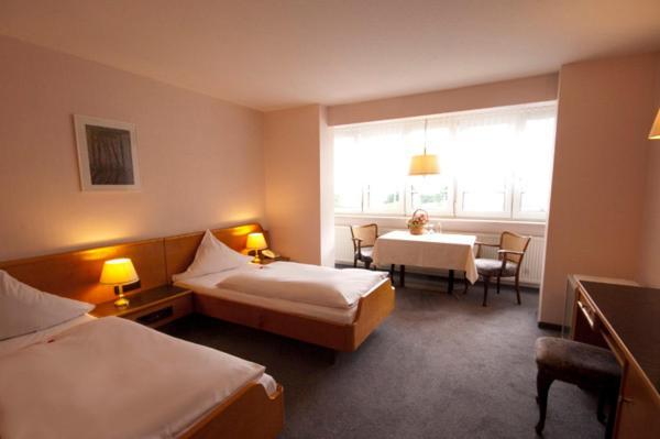 Hotel Goldinger Landstuhl Rum bild